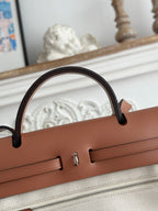 HERMES HERBAG ZIP 31 RETOURNE PEGASE POP BAG IN OFF-WHITE MIX RED CANVAS AND HUNTER COWHIDE