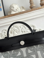 HERMES HERBAG ZIP 31 LAQUERED BAG IN OFF-WHITE MIX BLACK H PLUME CANVAS