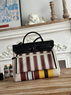 HERMES HERBAG ZIP 31 LAQUERED BAG IN BROWN MIX YELLOW H PLUME CANVAS