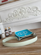 HERMES MINI NEO 17 EVELYNE BAG IN SKY BLUE CANVAS AND WHITE CALFSKIN