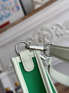HERMES MINI NEO 17 EVELYNE BAG IN EMERALD GREEN CANVAS AND WHITE CALFSKIN