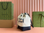 GUCCI DRAWSTRING SHOULDER BAG LOGO PRINT 31 IN WHITE CANVAS DARK BLUE CALFSKIN
