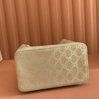 GUCCI 26S  EMBLEM BUCKET BAG 19 IN BEIGE AND SILVER CANVAS