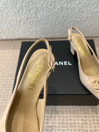 CHANEL MID-HEEL SLINGBACKS IN BISQUE BEIGE PATENT CALFSKIN