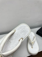 CHANEL THONG SLIPPERS IN WHITE LAMBSKIN