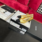 CHANEL HIGH MARY JANE IN GOLDEN CALFSKIN AND BLACK SATIN