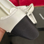 CHANEL HIGH MARY JANE IN WHITE CALFSKIN AND BLACK SATIN