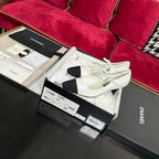CHANEL HIGH MARY JANE IN WHITE CALFSKIN AND BLACK SATIN