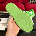 CHANEL TRAINERS IN LIGHT GREEN SHINY CALFSKIN