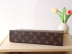 LOUIS VUITTON LV 25S POCHETTE VOYAGE 26 IN YELLOW MONOGRAM MACASSAR COATED CANVAS