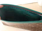 LOUIS VUITTON LV 25S POCHETTE VOYAGE 26 IN BORNEO GREEN MONOGRAM MACASSAR COATED CANVAS