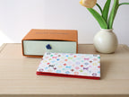 LOUIS VUITTON DOLL PASSPORT WALLET IN WHITE MIX COLORFUL CALFSKIN
