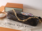 LOUIS VUITTON PANDA POCHETTE BAG 22 IN BROWN MONOGRAM COATED CANVAS