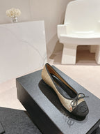 CHANEL BALLET FLATS IN GOLDEN GLITTERED TULLE AND BLACK SATIN