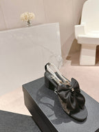 CHANEL HIGH SANDAL WITH PEARL CHAIN BLACK LAMBSKIN WITH RHINESTONES