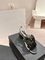 CHANEL HIGH SANDAL WITH PEARL CHAIN BLACK LAMBSKIN WITH WHITE RHINESTONES