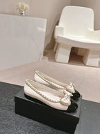 CHANEL BOWKNOT BALLET FLAT IN WHITE MIX BLACK SHEEPSKIN