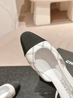 CHANEL SLINGBACKS IN WHITE LAMBSKIN AND BLACK SATIN