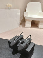 CHANEL SLINGBACKS IN BLACK LAMBSKIN AND SATIN