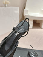 CHANEL SLINGBACKS IN BLACK LAMBSKIN AND SATIN