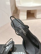 CHANEL HIGH SLINGBACKS IN BLACK LAMBSKIN AND SATIN