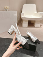 CHANEL HIGH SLINGBACKS IN WHITE LAMBSKIN AND BLACK SATIN