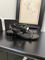 CHANEL FLAT SANDALS 5 MM IN BLACK CALFSKIN