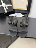 CHANEL MID HEEL SANDALS IN BLACK CALFSKIN WITH BOW