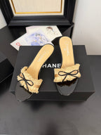 CHANEL SAND YELLOW GROSGRAIN CANVAS BOW MULE SANDALS 65 MM