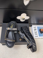CHANEL THICK-SOLED SANDALS 55 MM IN BLACK CALFSKIN