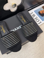 CHANEL FLAT SLIDE IN BLACK SUEDE WITH SILVER CHAIN