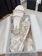 CHANEL THREE-STRAPS SANDALS IN WHITE CALFSKIN WITH GOLD HARDWARE