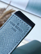 LOUIS VUITTON DISTRICT PM 26 IN CELESTE GREEN CALFSKIN