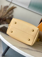 LOUIS VUITTON LOW KEY HOBO PM 28 IN URBAN YELLOW CALFSKIN GOLD BUCKLE