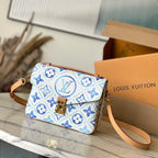 LOUIS VUITTON POCHETTE MÉTIS 25 IN LAGOON BLUE MONOGRAM TILES CANVAS GOLD HARDWARE