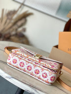 LOUIS VUITTON POCHETTE MÉTIS 25 IN CORAL MONOGRAM TILES CANVAS GOLD HARDWARE