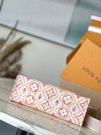 LOUIS VUITTON ONTHEGO EAST WEST 25 IN CORAL MONOGRAM TILES CANVAS