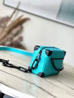LOUIS VUITTON MINI SOFT TRUNK 18 IN TURQUOISE BLUE TAURILLON