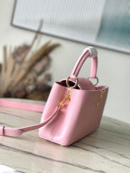 LOUIS VUITTON CAPUCINES EAST-WEST 33 IN BLUSH PINK CALFSKIN GOLD HARDWARE