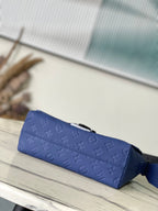 LOUIS VUITTON S-CAPE MESSENGER 28 IN SAPPHIRE BLUE TAURILLON