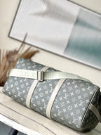 LOUIS VUITTON KEEPALL BANDOULIÈRE 45 IN GRAY MONOGRAM GRADIENT CANVAS