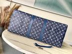 LOUIS VUITTON KEEPALL BANDOULIÈRE 55 IN NAVY GREEN MONOGRAM GRADIENT CANVAS