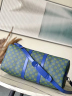 LOUIS VUITTON KEEPALL BANDOULIÈRE 45 IN BLUE GREEN DAMIER HERITAGE COATED CANVAS