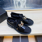 CHANEL COMBAT OXFORD SHOES IN BLACK WRINKLED CALFSKIN AND GROSGRAIN WITH FAUX PEARL
