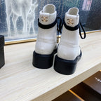 CHANEL COMBAT BOOTS IN WHITE WRINKLED CALFSKIN AND BLACK GROSGRAIN WITH FAUX PEARL