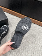 CHANEL CLASSIC TRAINER IN BLACK FABRIC