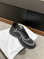 CHANEL CLASSIC TRAINER IN BLACK FABRIC