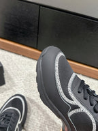 CHANEL CLASSIC TRAINER IN BLACK FABRIC