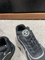 CHANEL CLASSIC TRAINER IN BLACK FABRIC