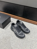 CHANEL CLASSIC TRAINER IN BLACK FABRIC